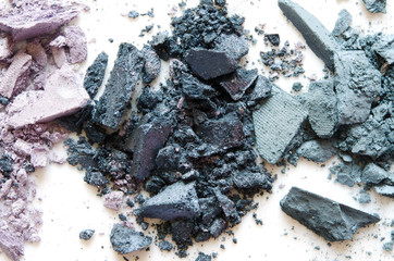 Crushed eyeshadow makeup set isolated on white background. Close-up. - Image