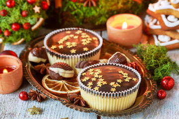 Chocolate Christmas cookies decorated with tiny edible stars.