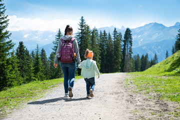 Mother And Daughter Walking Hiking Trail