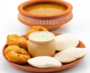 South Indian Popular Breakfast Idli Vada Served With Sambar And Coconut Chutney Also Know as Vadai, Vade, Idly or Medu Vada