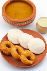 South Indian Popular Breakfast Idli Vada Served With Sambar And Coconut Chutney Also Know as Vadai, Vade, Idly or Medu Vada