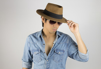 Portrait Man in Jeans Shirt or Denim Shirt Fashion Wear Eyeglasses and Hat