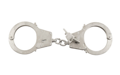 Handcuffs with keys isolated on white background