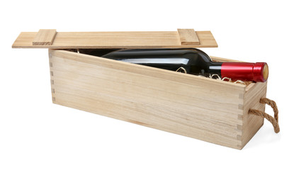 Open wooden crate with bottle of wine isolated on white