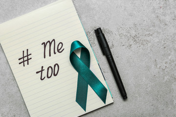 Teal awareness ribbon, pen and paper with hashtag METOO on grey background, flat lay. Stop sexual assault - Powered by Adobe
