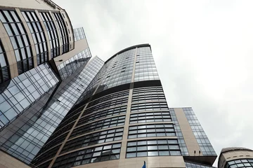 Deurstickers KYIV, UKRAINE - MAY 21, 2019: Low angle view of modern hotel HILTON © New Africa