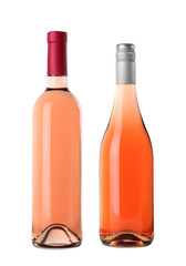 Bottles of delicious rose wine on white background. Mockup for design