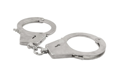 Steel metallic handcuffs isolated on white background