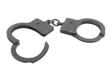 Black metallic handcuffs isolated on white