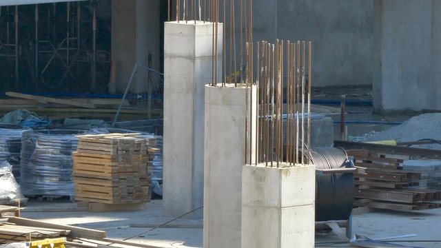 Metal rods on the cemented posts of the building