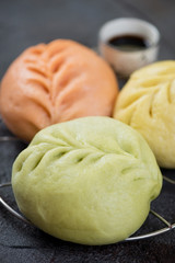 Closeup of korean pjan-se or traditional steamed buns, vertical shot, selective focus