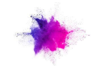 Freeze motion of purple color powder exploding on white background.