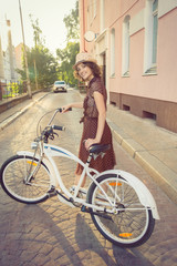 Fototapeta premium girl with bicycle