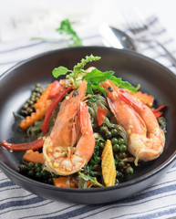 Spicy stir fried noodles with shrimp and holy basil leaves