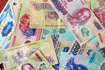 Various Vietnamese dong banknotes close-up. Money background