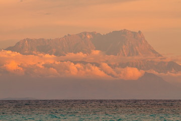 Majestic mount Kinabalu view from Mantanani island, Sabah Malaysia. Mt Kinabalu is the highest peak in Southern Asia.