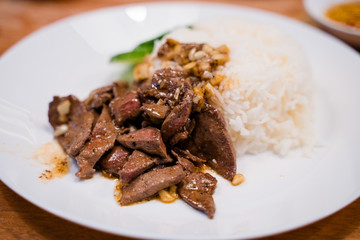 Fried pork liver with salt garlic and pepper.