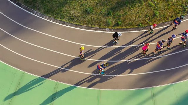 Roller scater top view. Kids sport school. Rollerdrome circles. Aerial top view. Child sport