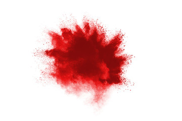 Red powder explosion on white background. Colored cloud. Colorful dust explode. Paint Holi.