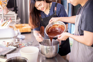 Beautiful woman is making bakery