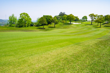 Golf Course with beautiful green field. Golf course with a rich green turf beautiful scenery.