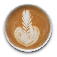 Top view of a mug of latte art coffee isolted on white background.