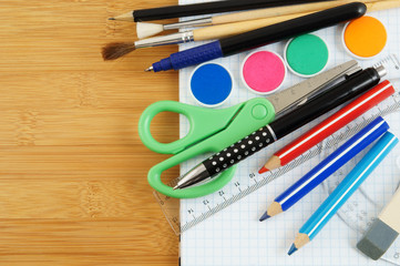 School supplies on notepad, education concept