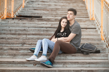 Young couple on a walk in autumn park