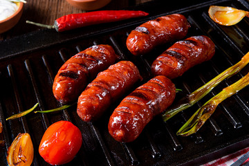 Chili chorizo ​​sausage with tomato bruschetta - obrazy, fototapety, plakaty