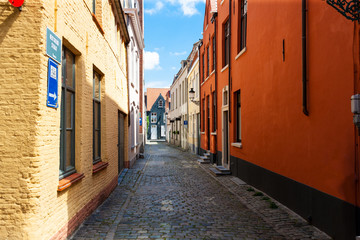 Fototapeta na wymiar Colourful narrow street in Brugge, Bruges, Belgium