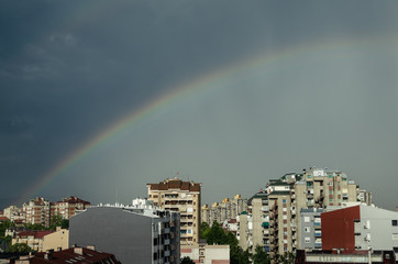 Rainbow over city