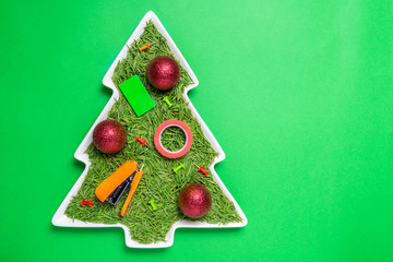 Christmas tree concept, spruce needles in porcelain plate, Office  Christmas decorations
