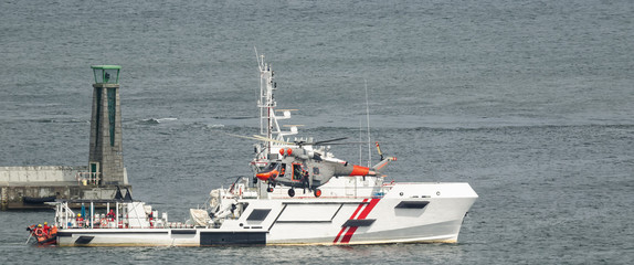 HELICOPTER AND SHIP - A sea Search And Rescue boat and marine rescue helicopter Polish Coast Guard...