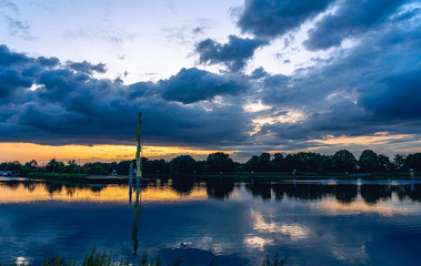 german water lake called HERNER MEER at the evening with very nice clouds sunset