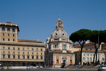 Fototapeta na wymiar Church Santa Maria di Loreto near the Forum of Caesar - Viaggio nei Fori , view from from Via dei Fori Imperiali street, Rome, Italy