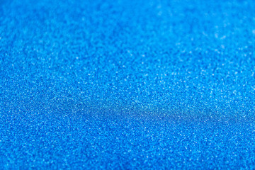 Brilliant shiny backdrop from textile. Shimmer denim paper.