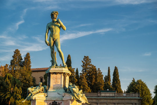 Bronze statue of David at Piazzale Michelangelo in the sunset