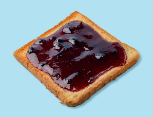 Blueberry jam toast on blue
