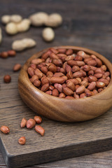 Peanut. Wooden table. Healthy diet