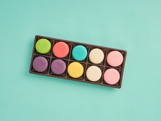 Macarons pattern on pastel blue background