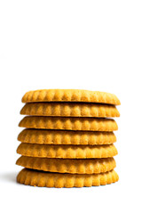 Golden biscuits isolated on white