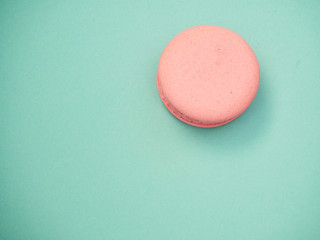 Colorful macarons on a blue background