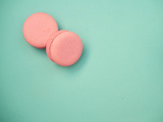 Colorful macarons on a blue background