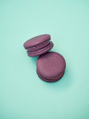 Colorful macarons on a blue background