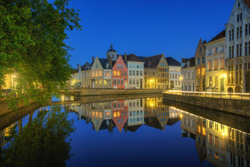 Naklejka na ściany i meble Beautiful city Bruges (Brugge) old town in Belgium at night, Europe