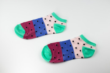 A pair of cotton women's socks on the table.