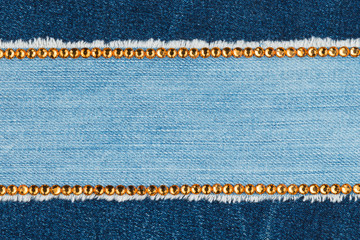 Two strips of rhinestones on denim. With space for design, text place. - 281930987