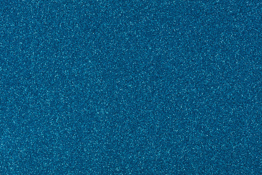 Glitter background in new blue tone as part of your awesome holiday design. High quality texture in extremely high resolution, 50 megapixels photo.