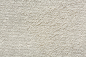 Ordinary soft textile background in white colour.