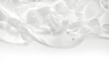 transparent gel dripping, white background
